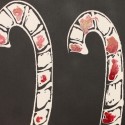 Candy Canes, ink and spray paint on canvas by Greg Yenoli